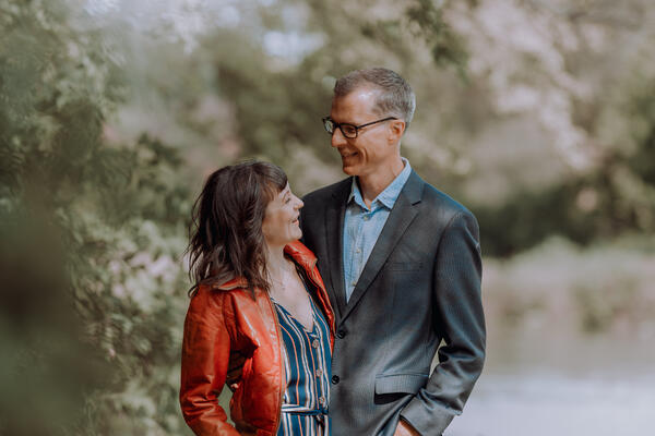 Steve & Erin smiling at each other