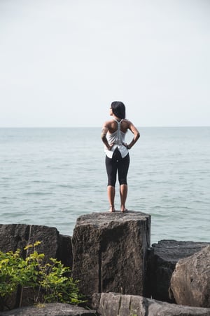 woman-takes-in-ocean-air_925x